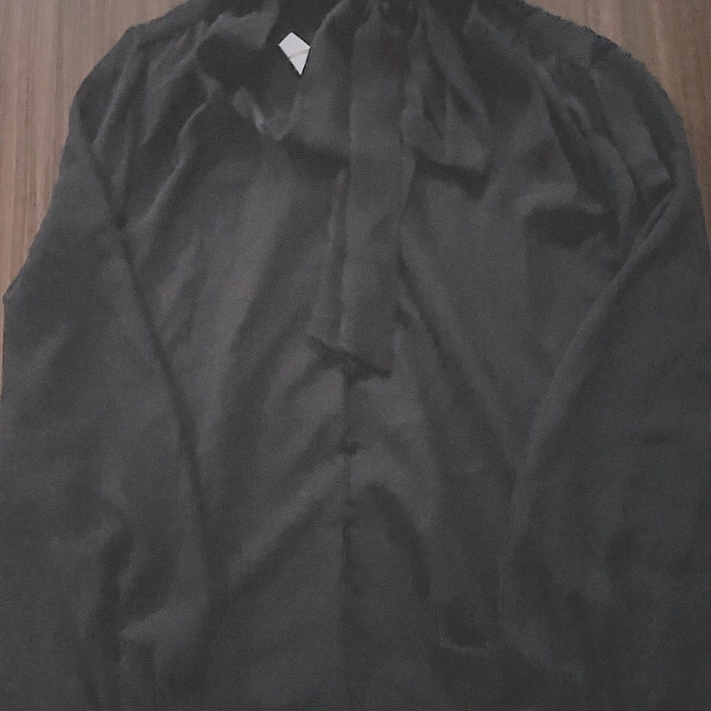 Black blouse with bow neck never used